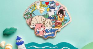 Carbon-neutral fridge magnets, serving as miniature portraits of coastal hotels and resorts